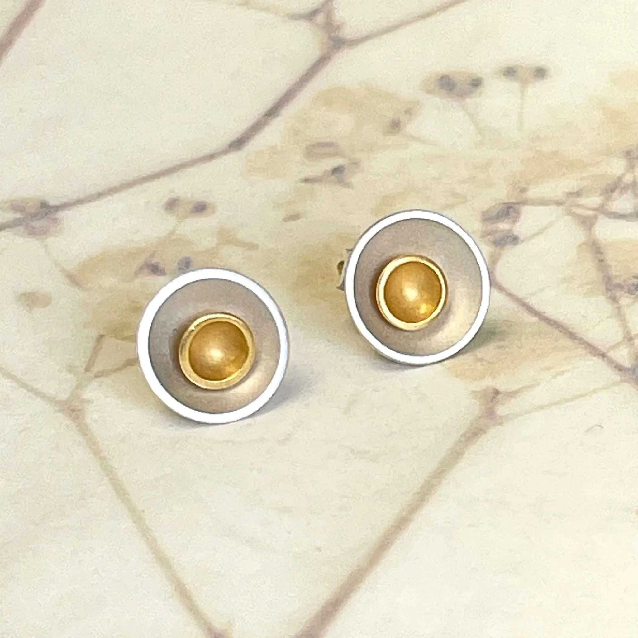 Gold and silver stud earrings